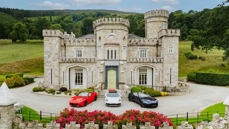 Luxury Vehicle Hire Ireland fleet lined up outside an Irish castle